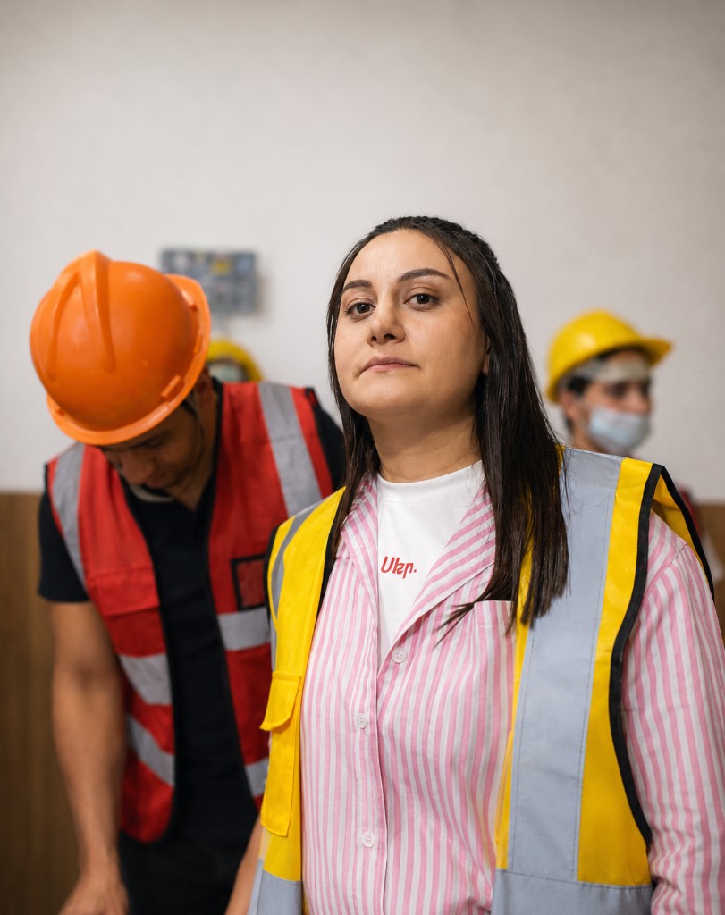 Safety professional in high-visibility vest during emergency preparedness training